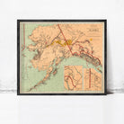 The image is a framed vintage map of Alaska, depicting the state's geographical layout and surrounding areas.
