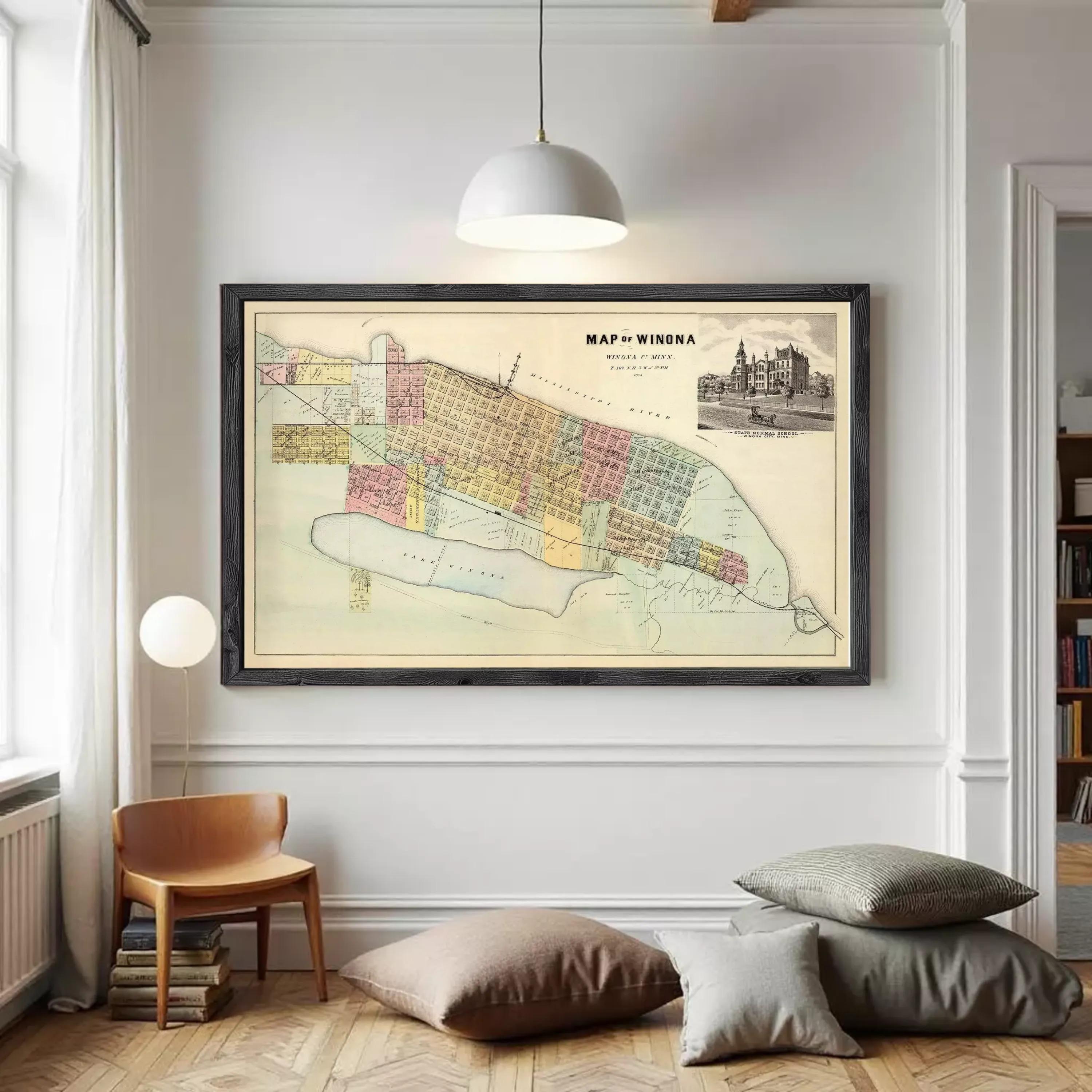 The image is a framed vintage map of Winona, Minnesota, depicting the city's layout and surrounding areas.