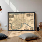 The image is a framed vintage map of a city, likely New Orleans, Louisiana, with a river running through the center.