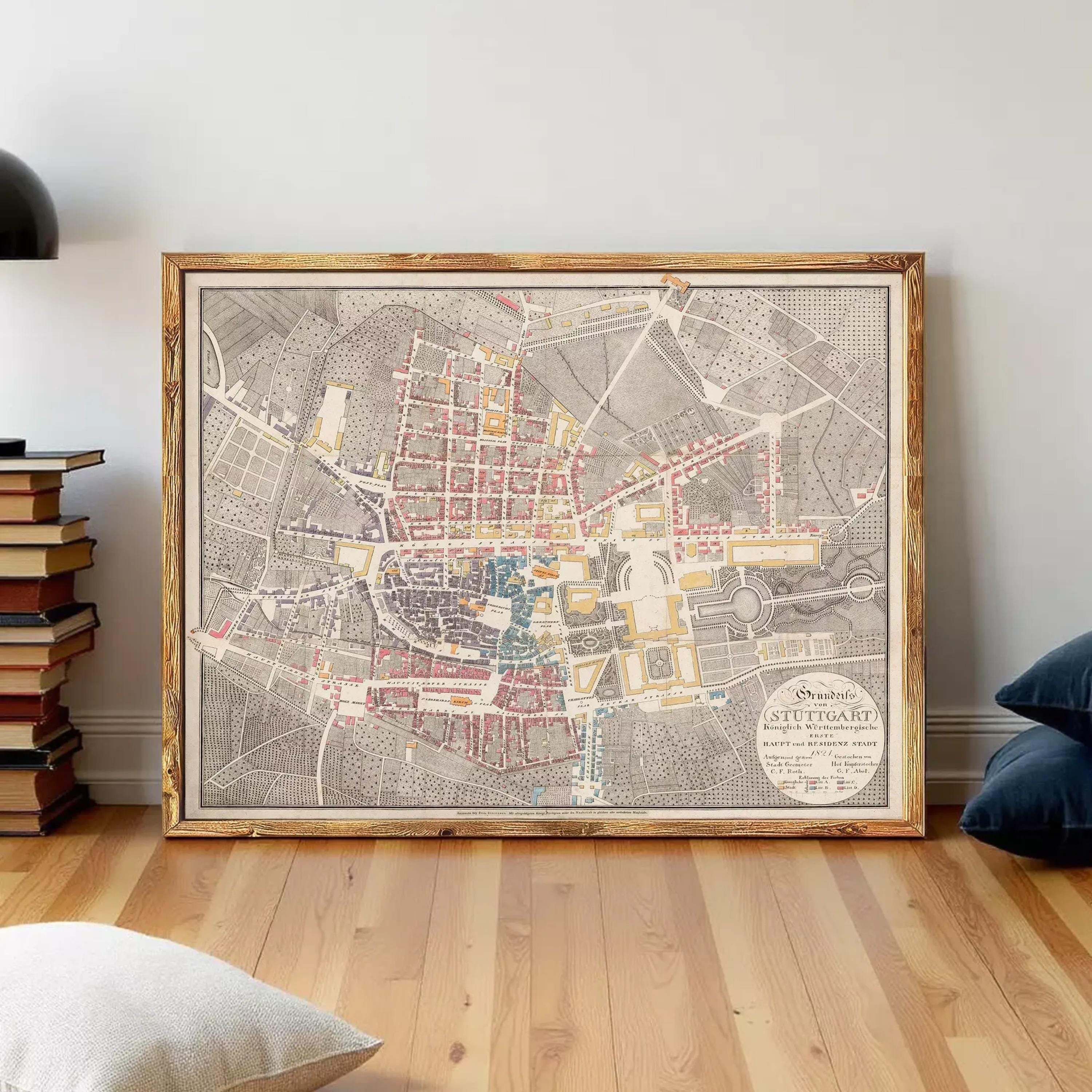 The image is a framed map of Stuttgart, Germany, depicting the city's layout and streets.