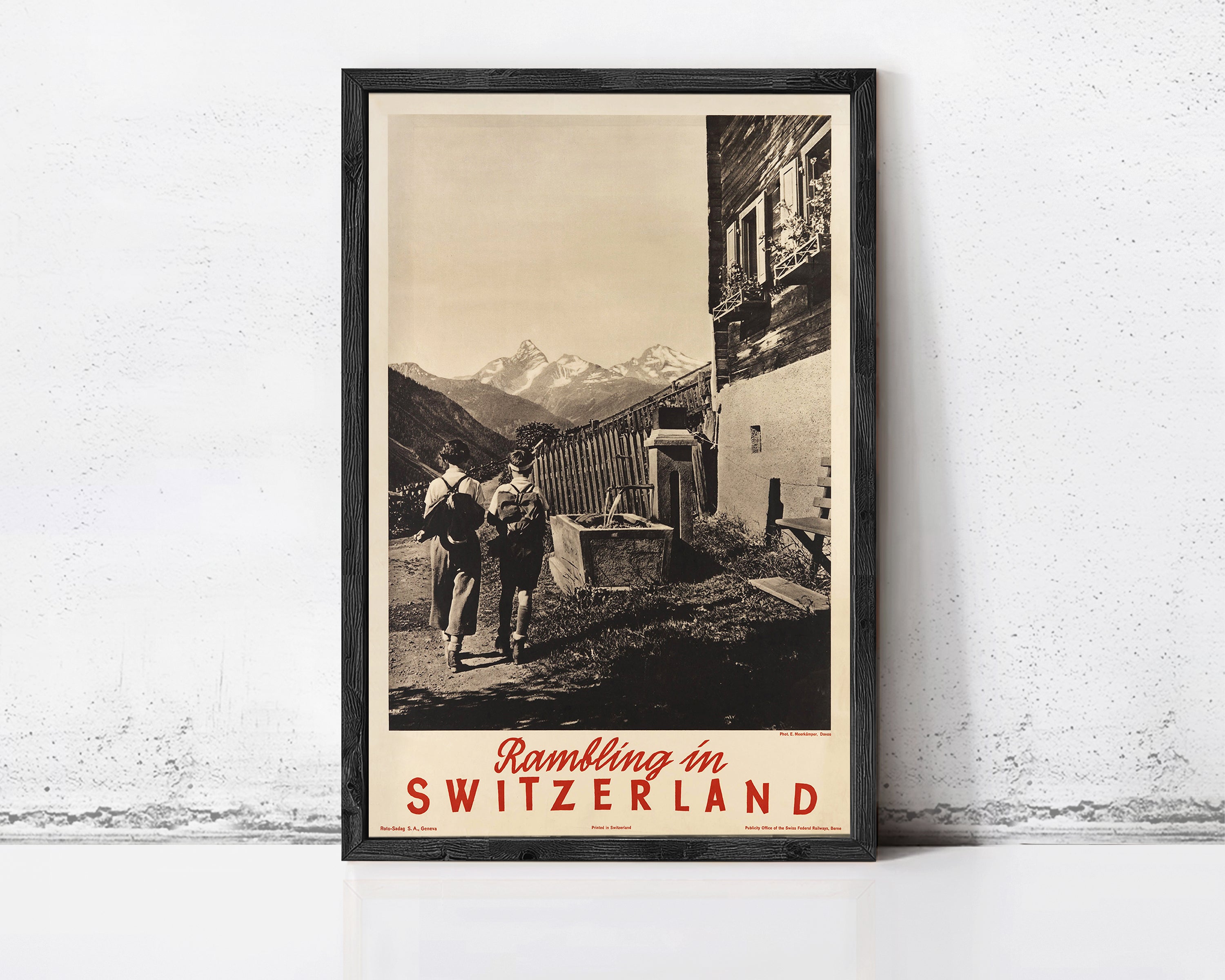 The image is a framed vintage travel poster advertising "Rambling in Switzerland".