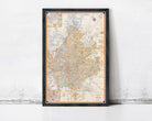 The image is a framed map of a city, likely showing the layout of streets, neighborhoods, and other geographic features.