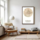 a cozy living room with a beige armchair, a wooden bench, and a framed map of Warsaw hanging on the wall.