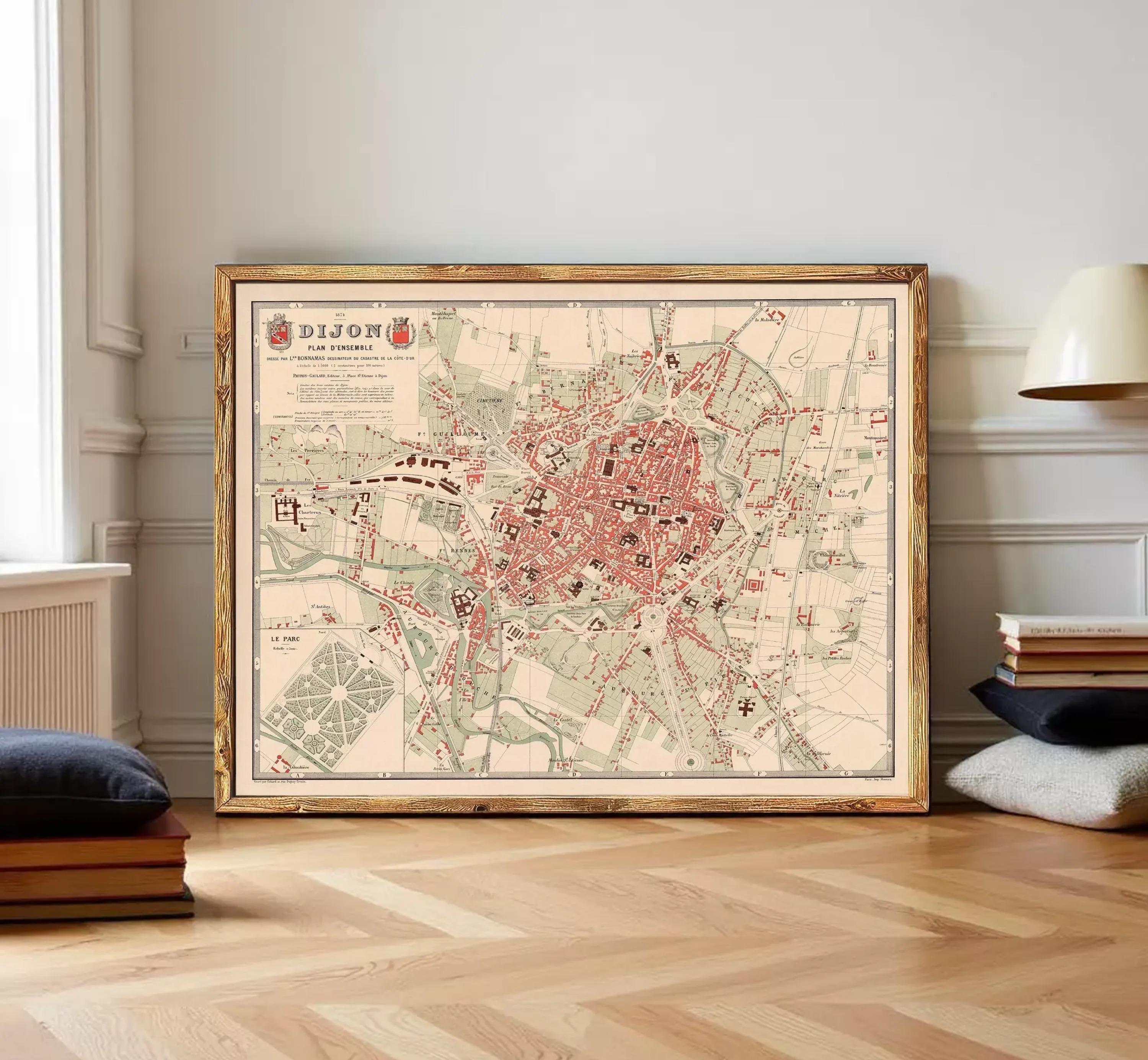 The image is a framed vintage map of a city, likely from the 19th century, with a detailed layout of streets, buildings, and other urban features.