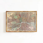The image is a framed map of London, England, depicting the city's streets, landmarks, and other geographical features.