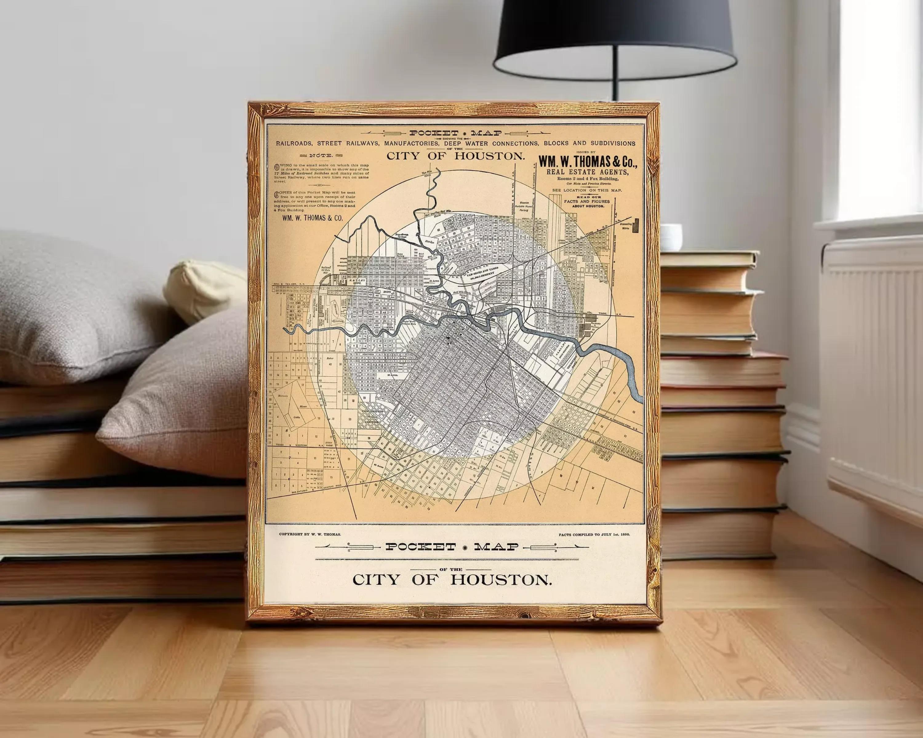 The image is a framed vintage map of the city of Houston, Texas, depicting the layout of the city and surrounding areas.