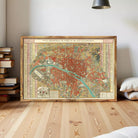 The image is a framed vintage map of Paris, France, depicting the city's streets and landmarks.