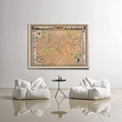 a large map of Tel Aviv, Israel, hanging on a white wall above a pair of white bean bag chairs and a small black table.