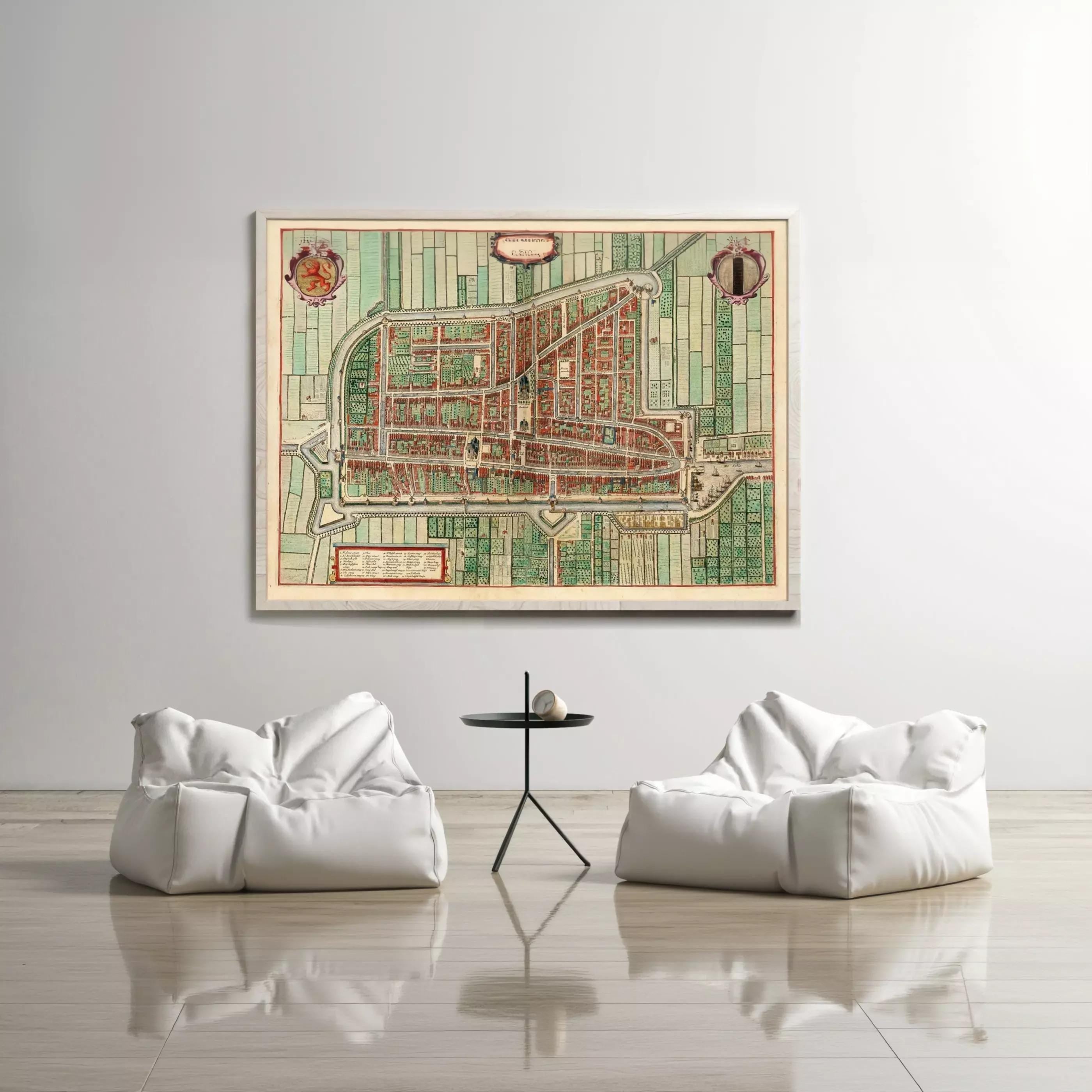 a large, colorful map of a city displayed on the wall above two white bean bag chairs and a small black table.