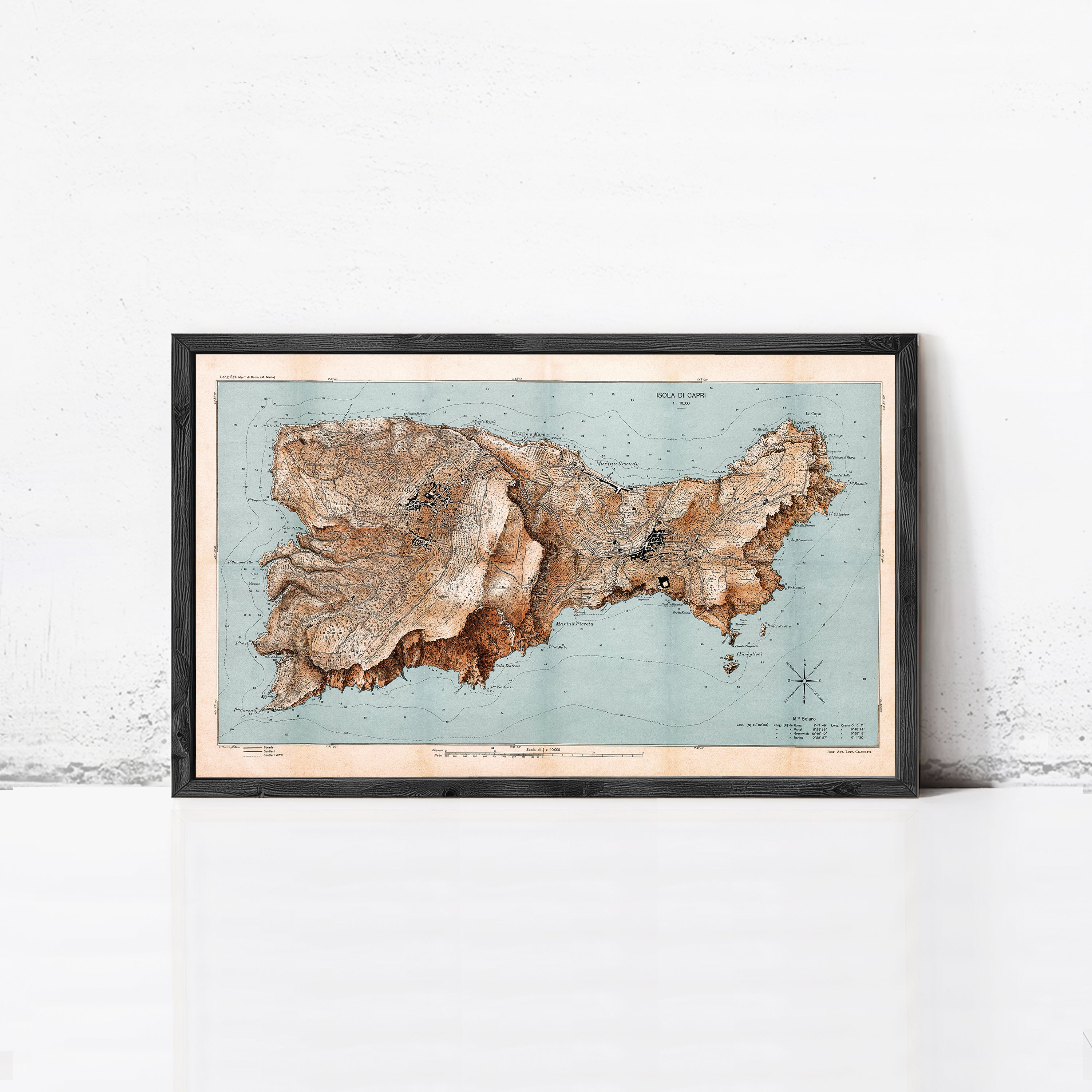 The image is a framed vintage map of a region, possibly depicting a mountainous area or island.