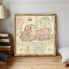 a framed map of New York State, with various regions and cities clearly labeled.