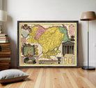 The image is a framed vintage map of the Nubia region, which includes illustrations of the Roman Colosseum, a temple, and other landmarks.