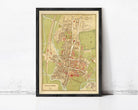 The image is a framed vintage map of Oxford, England, depicting the city's layout and surrounding areas.