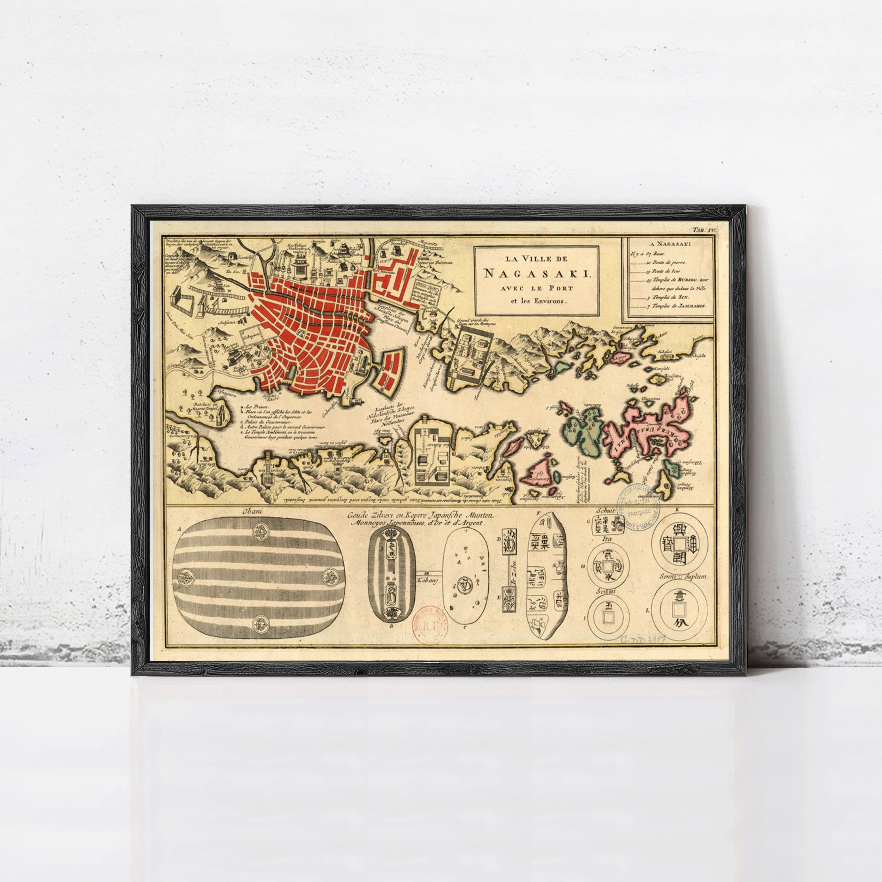 The image is a framed vintage map of Nagasaki, Japan, depicting the city and surrounding areas.