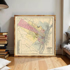 The image is a framed vintage map of the city of Albany, New York, depicting the town's layout and surrounding areas.