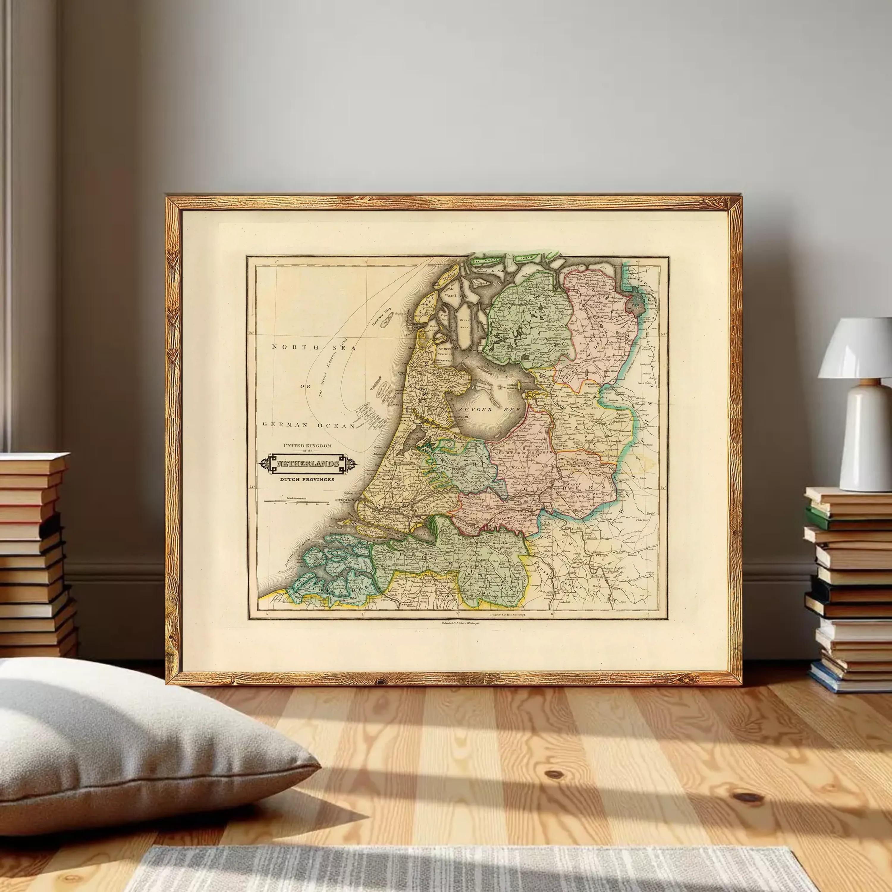 The image is a framed map of the Netherlands, depicting the country's geographical layout and boundaries.