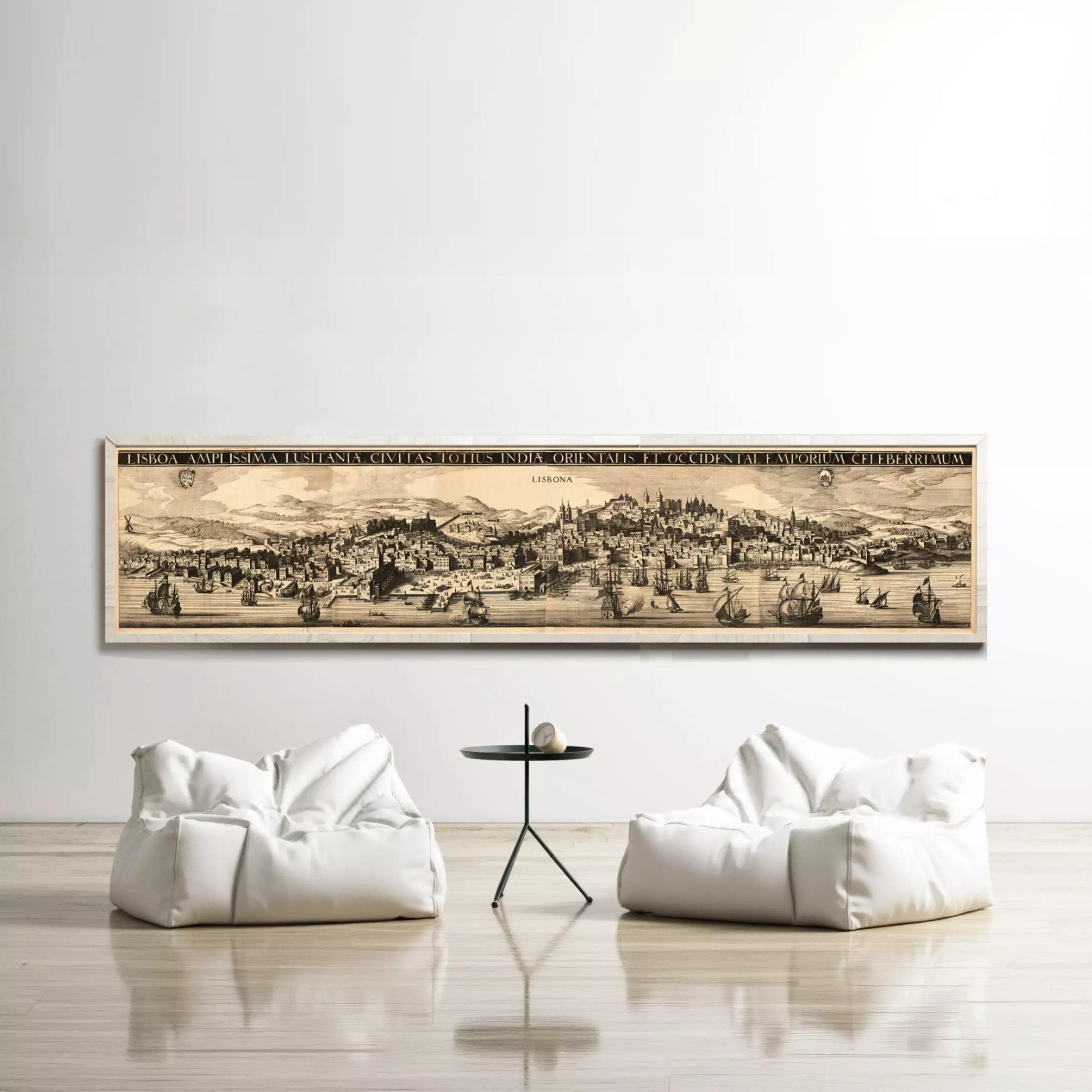 a large, detailed map of a city displayed on a wall, with two white bean bag chairs positioned in front of it.