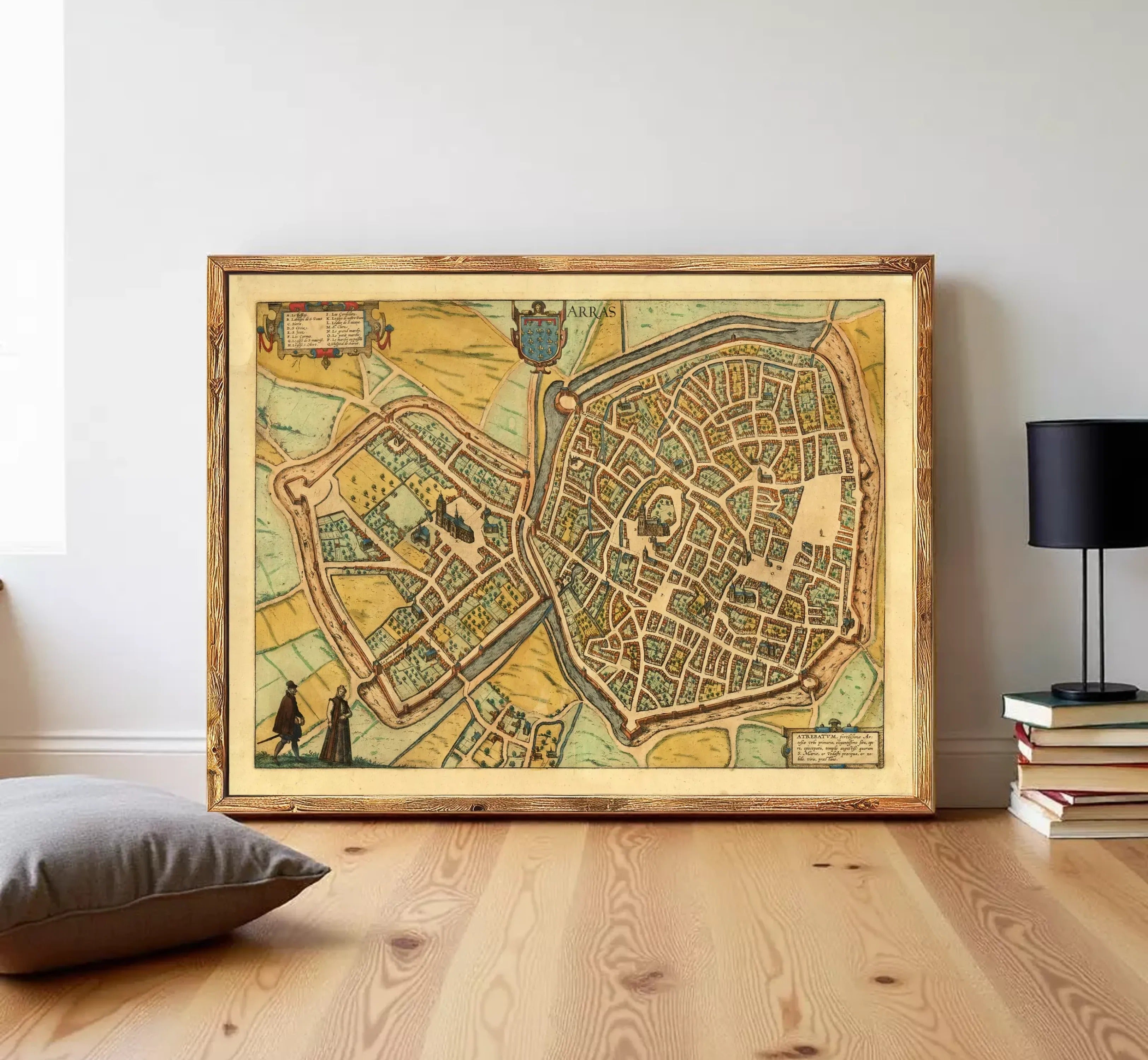The image is a framed vintage map of a city, depicting a detailed layout of the streets, buildings, and other landmarks.