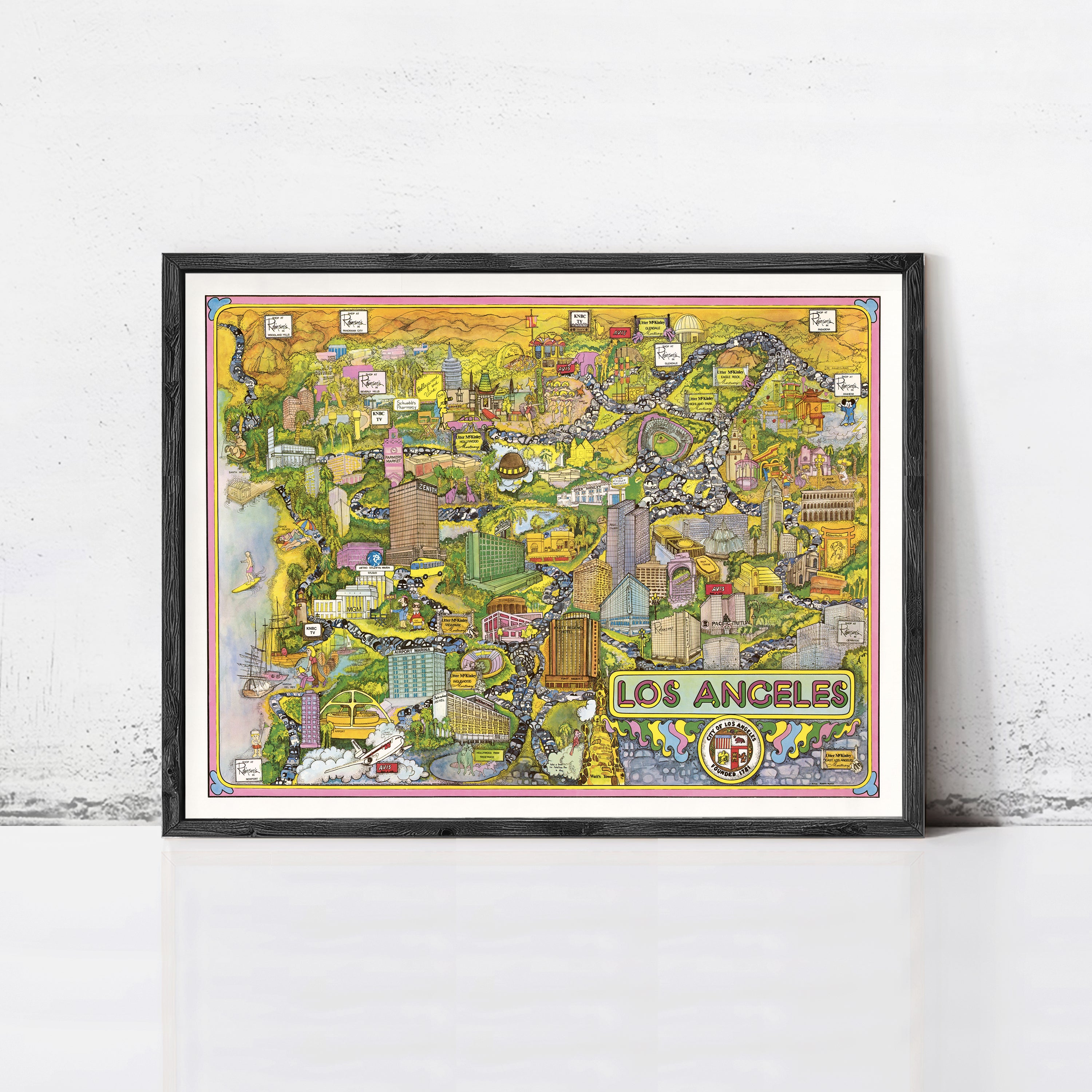 The image is a framed collage depicting various landmarks and scenes from Los Angeles, California.