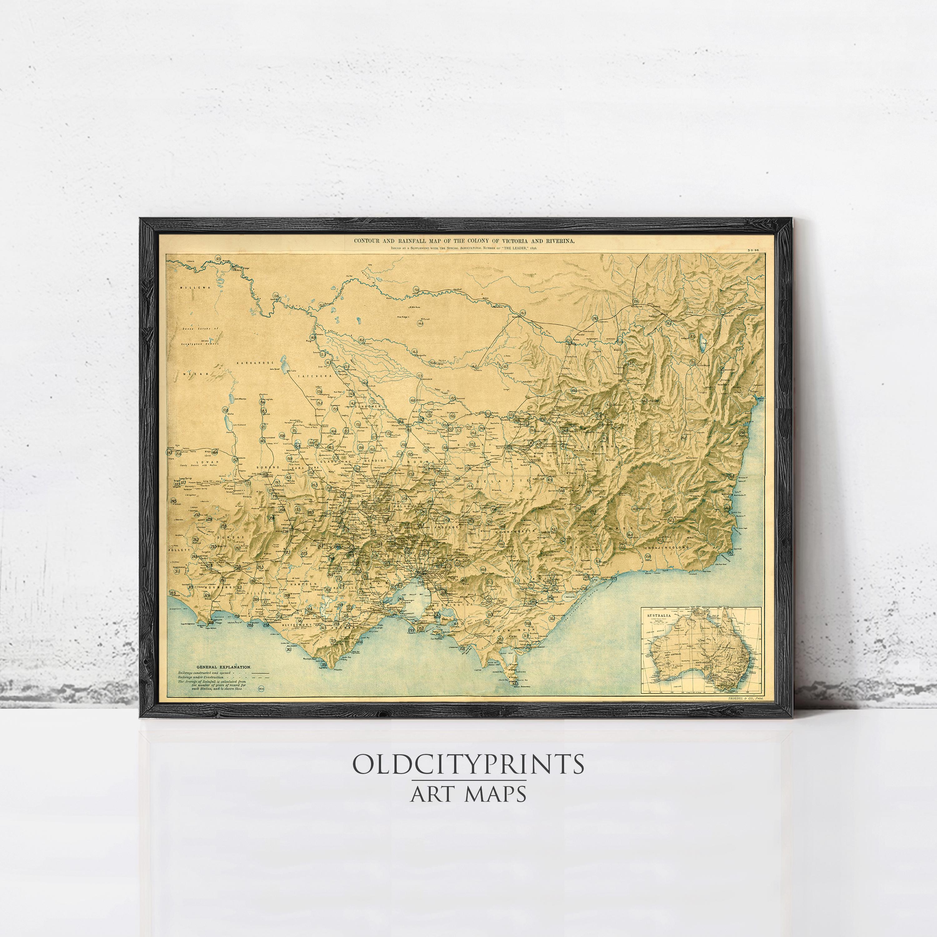 The image is a framed vintage map of Victoria and New South Wales, Australia, depicting the region's geographical layout and features.
