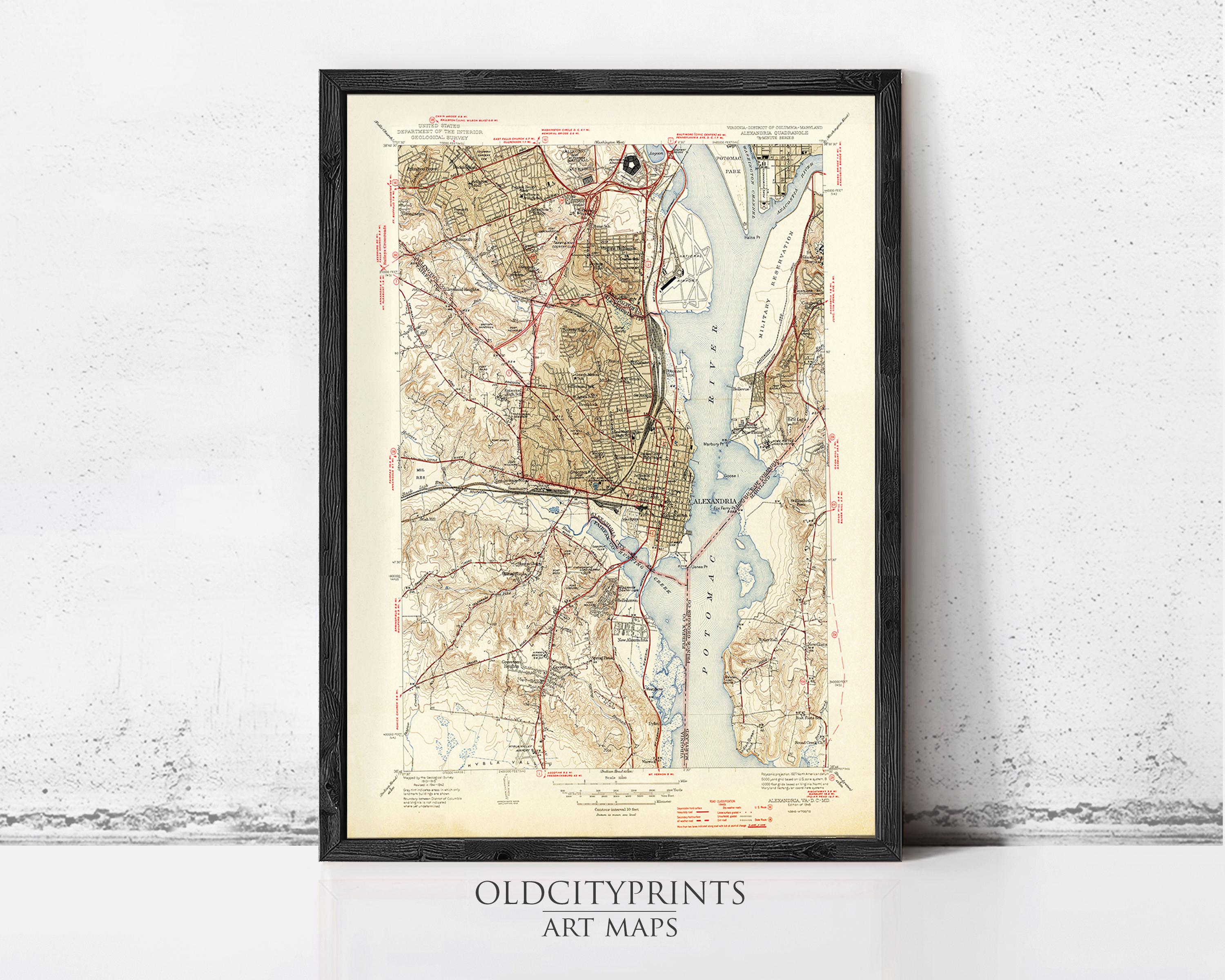 The image is a framed vintage map of the Washington, D.C. area, depicting the city's streets, waterways, and surrounding landscape.