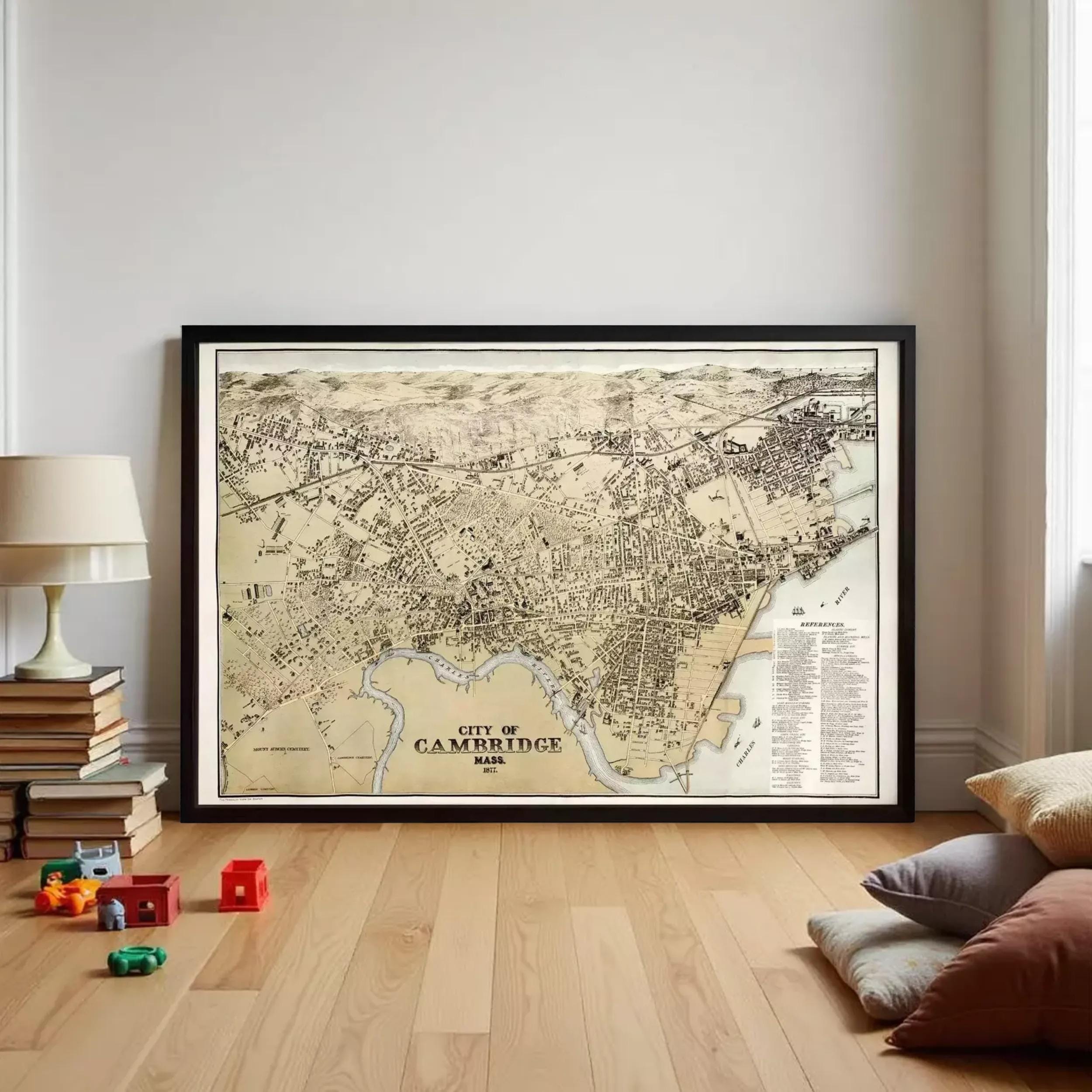 The image is a framed historical map of Cambridge, Massachusetts, depicting the city's layout and surrounding areas.