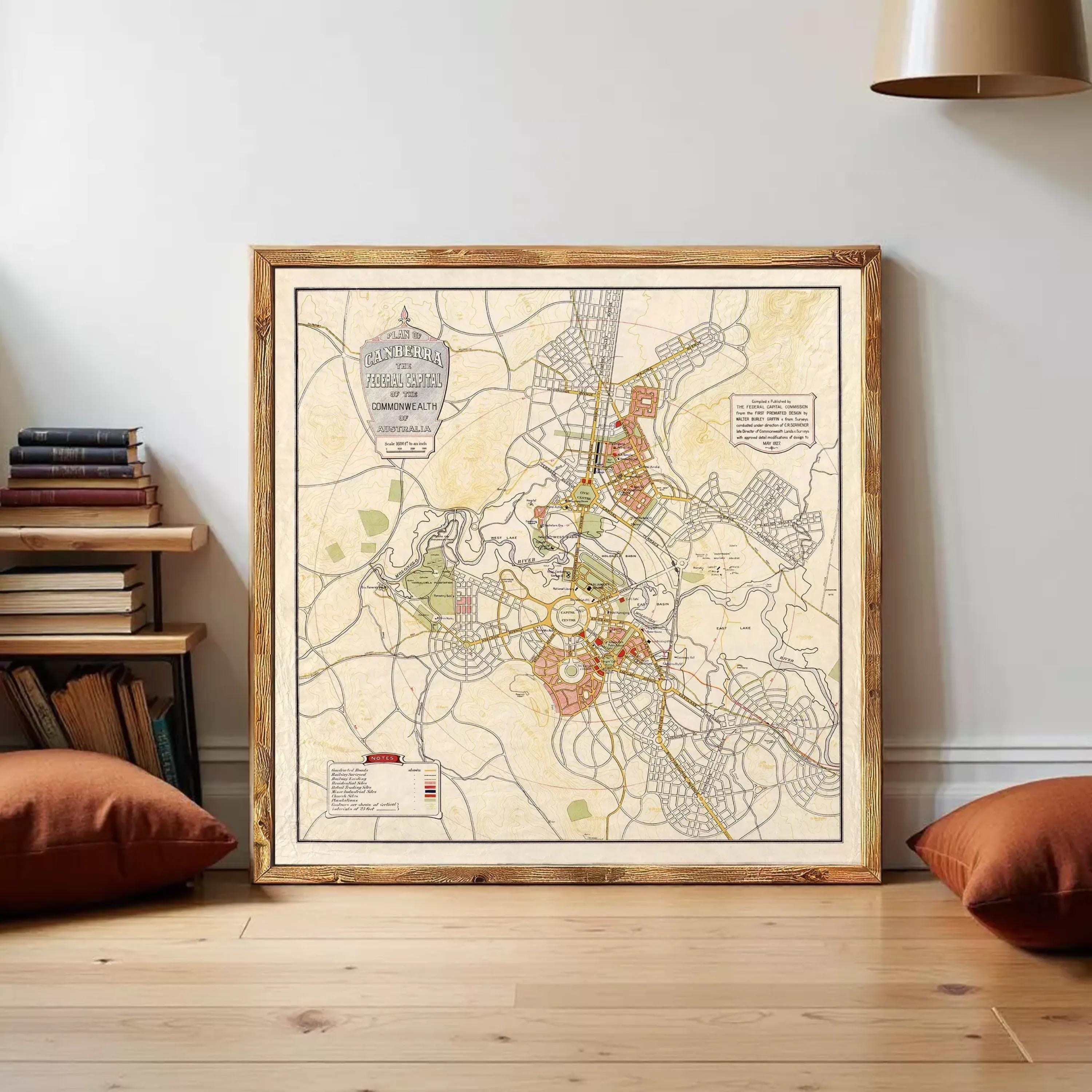 The image is a framed map of a city, depicting various streets, landmarks, and other geographical features.