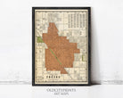 The image is a framed vintage map of the city of Fresno, California, with a black border and a beige background.