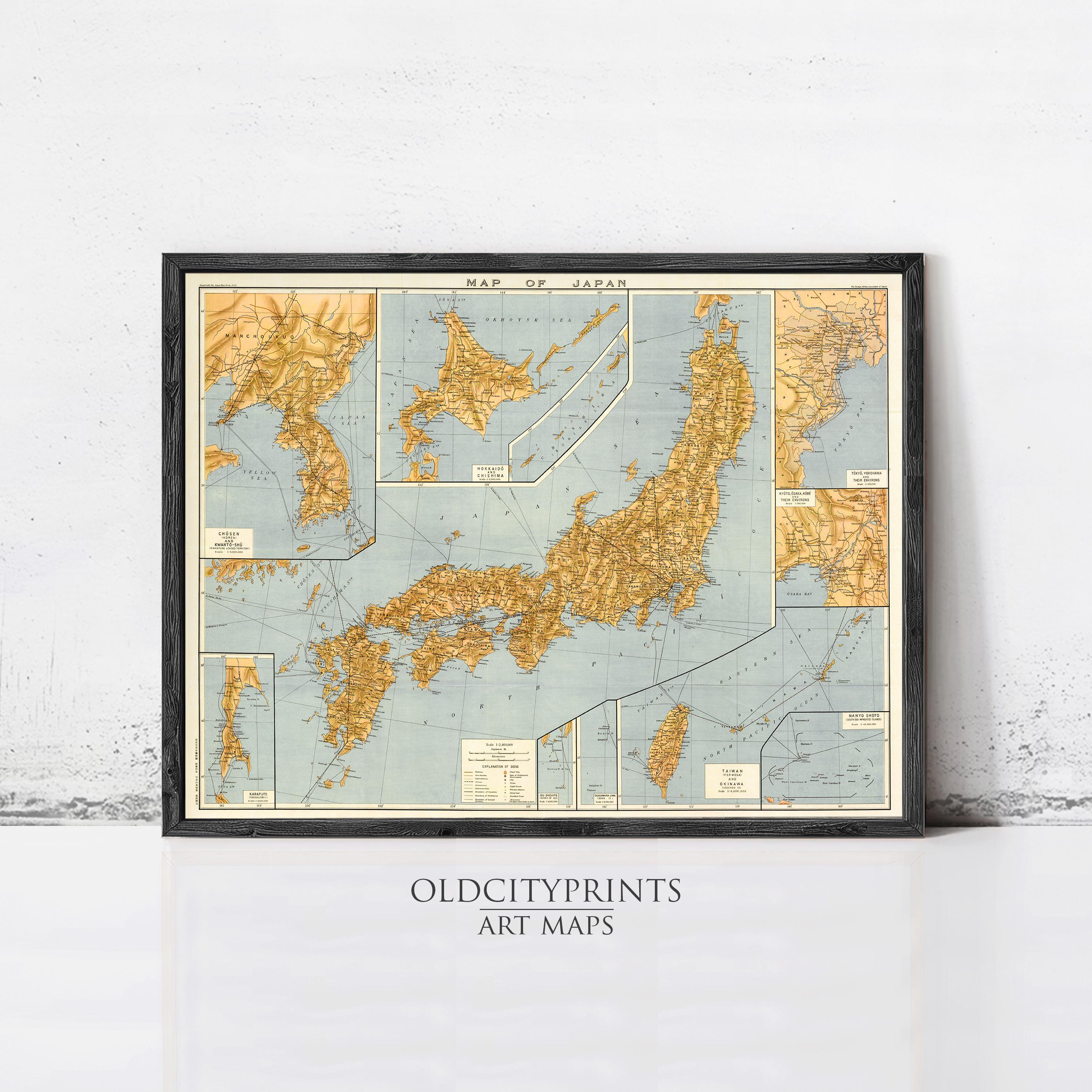 The image is a framed vintage map of Japan, depicting the country's geographical layout and surrounding areas.