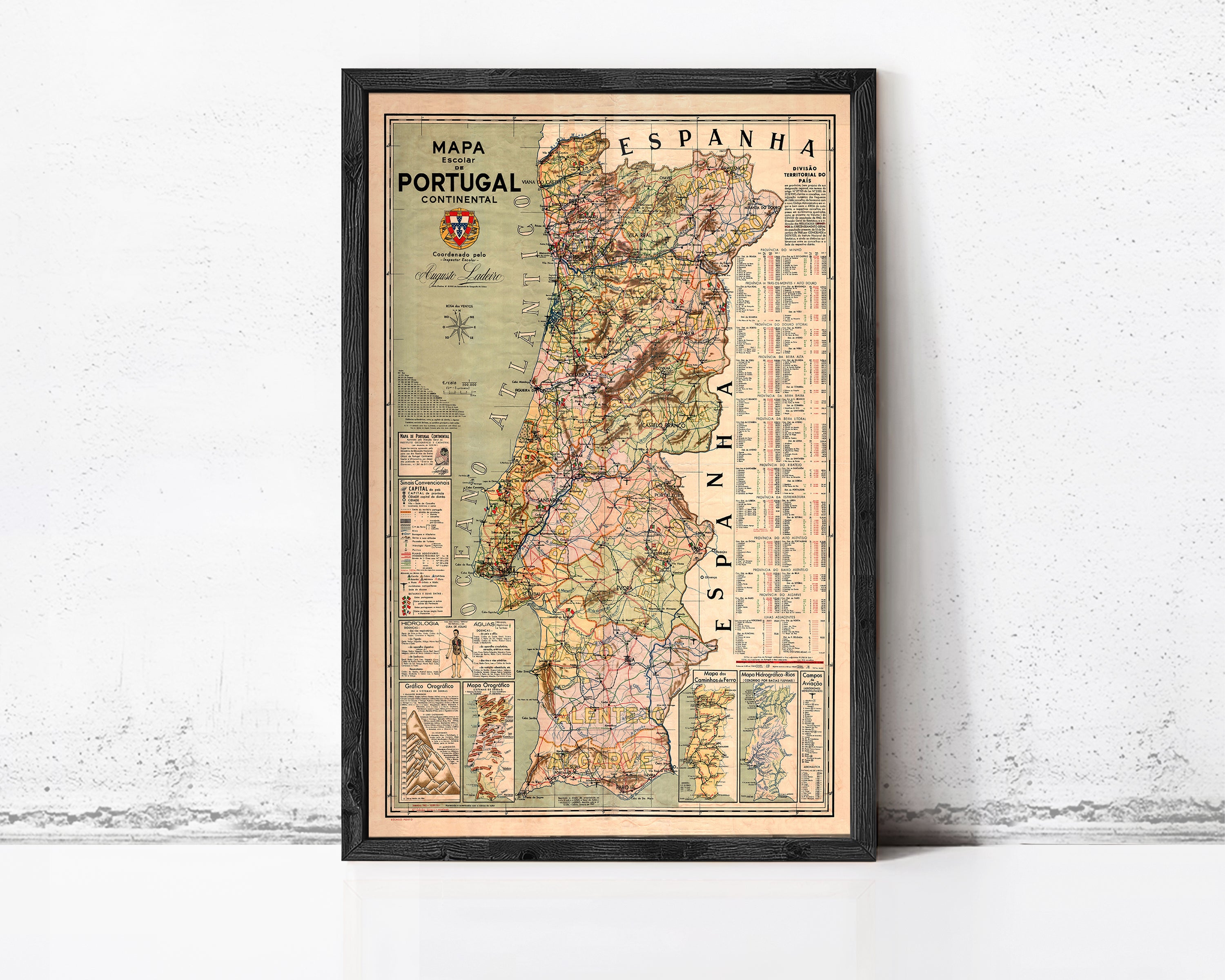 The image is a framed vintage map of Portugal, showing the country's geographical layout and surrounding areas.