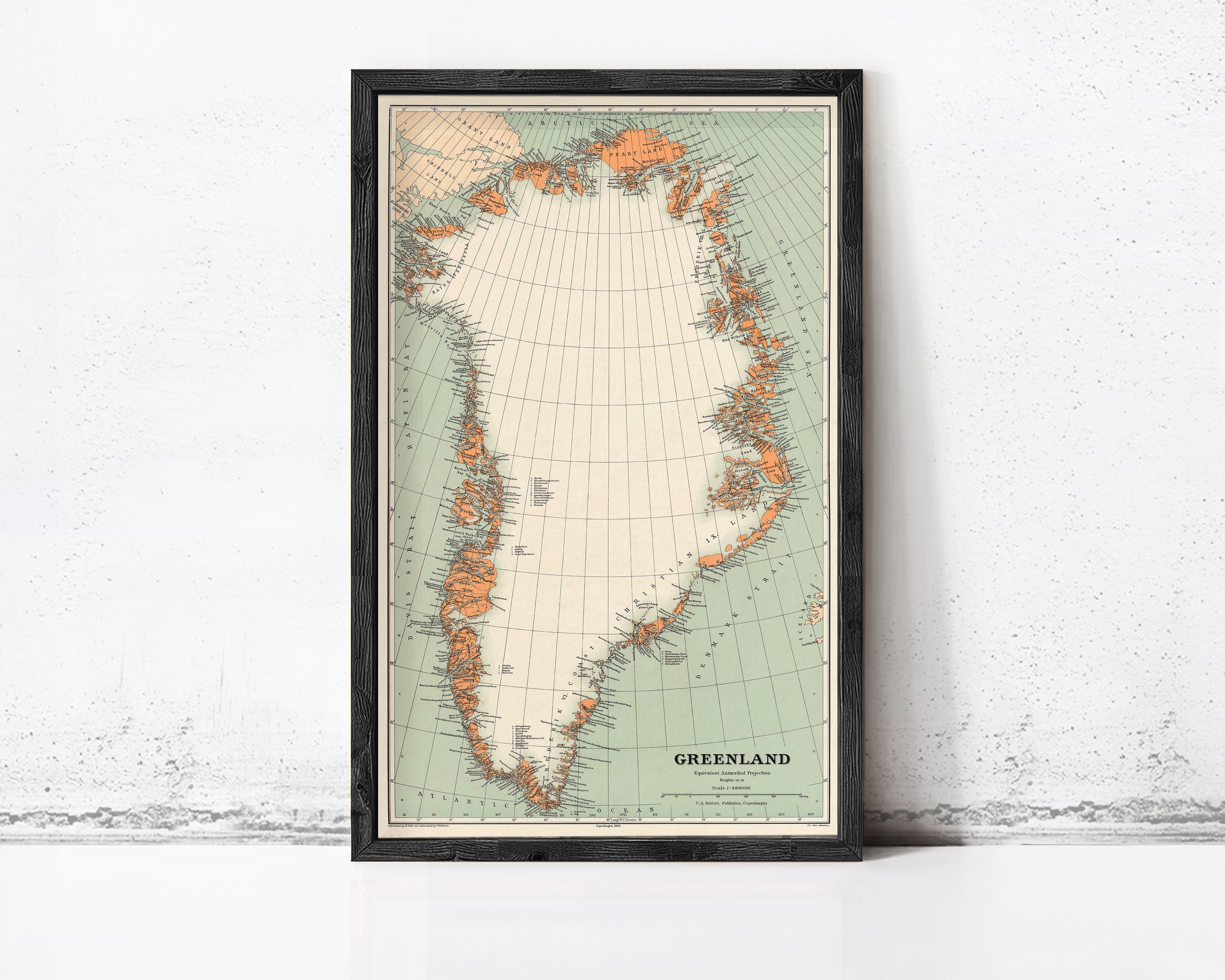 The image is a framed map of Greenland, depicting the country's geographical location and surrounding areas.