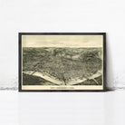 The image is a framed vintage map of Cincinnati, Ohio, depicting the city's layout and surrounding areas in a detailed and intricate manner.