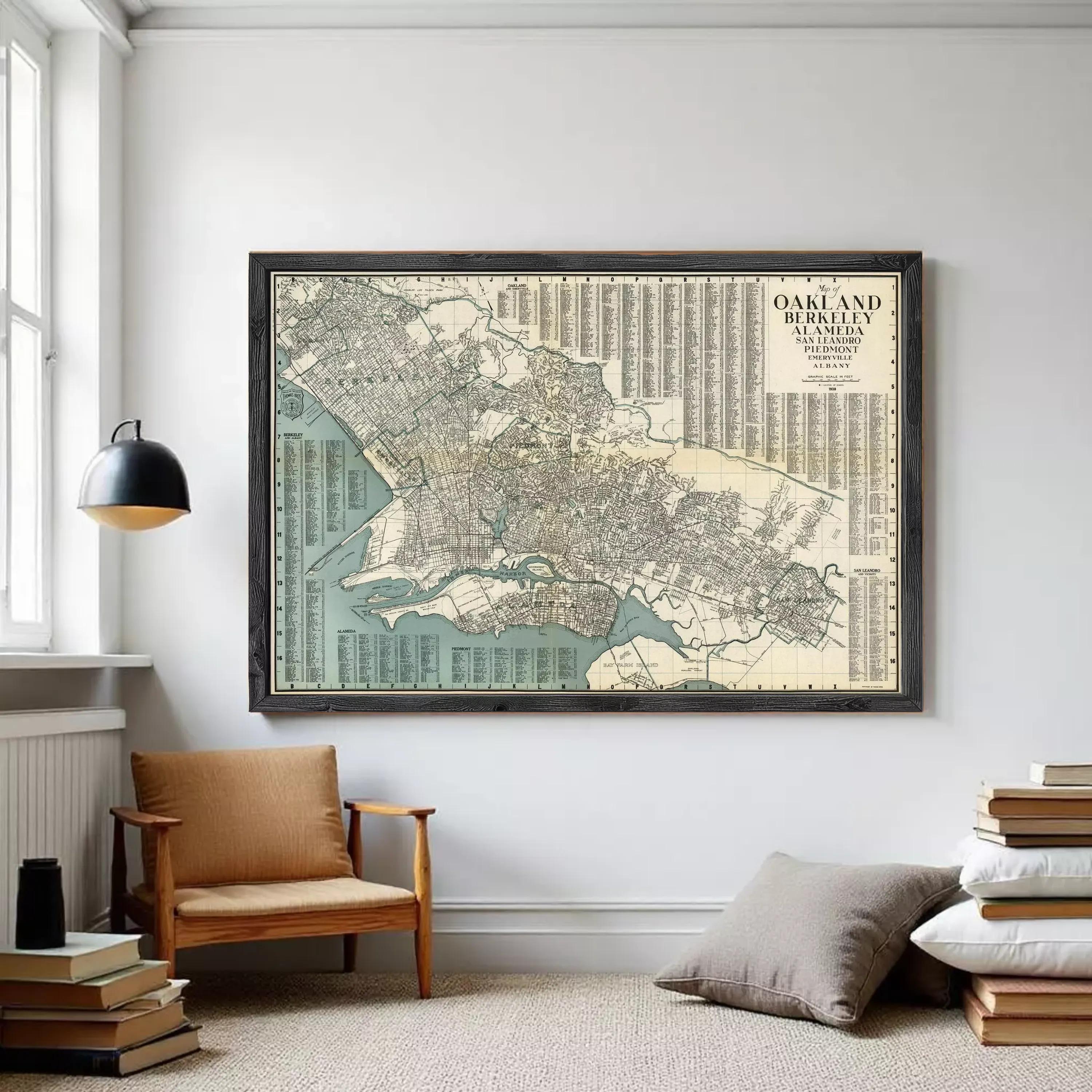 The image is a framed vintage map of Oakland, California, with a detailed layout of the city's streets and neighborhoods.