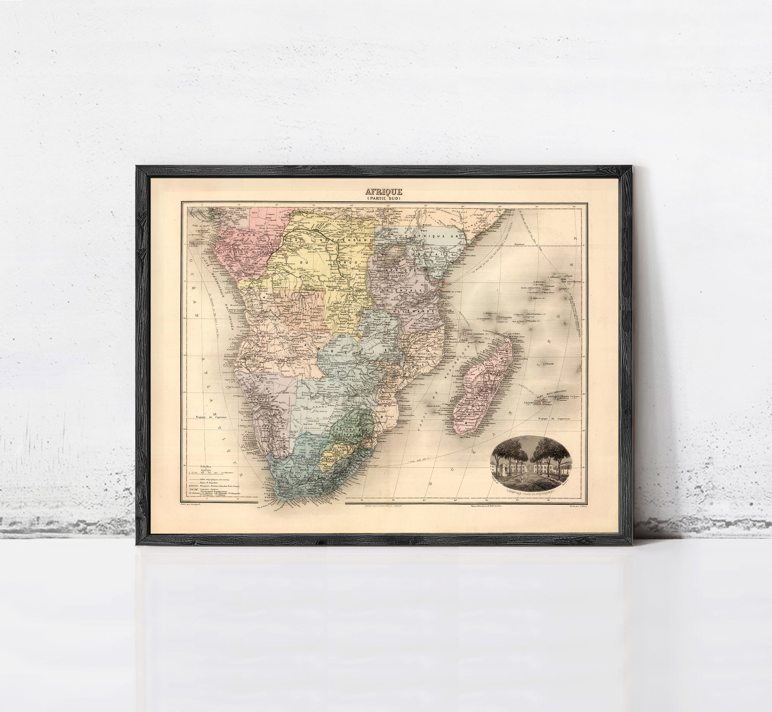The image is a framed vintage map of Africa, depicting the continent in a detailed and colorful manner.