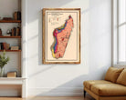 The image is a framed vintage map of Madagascar, depicting the country's geographical features and boundaries.
