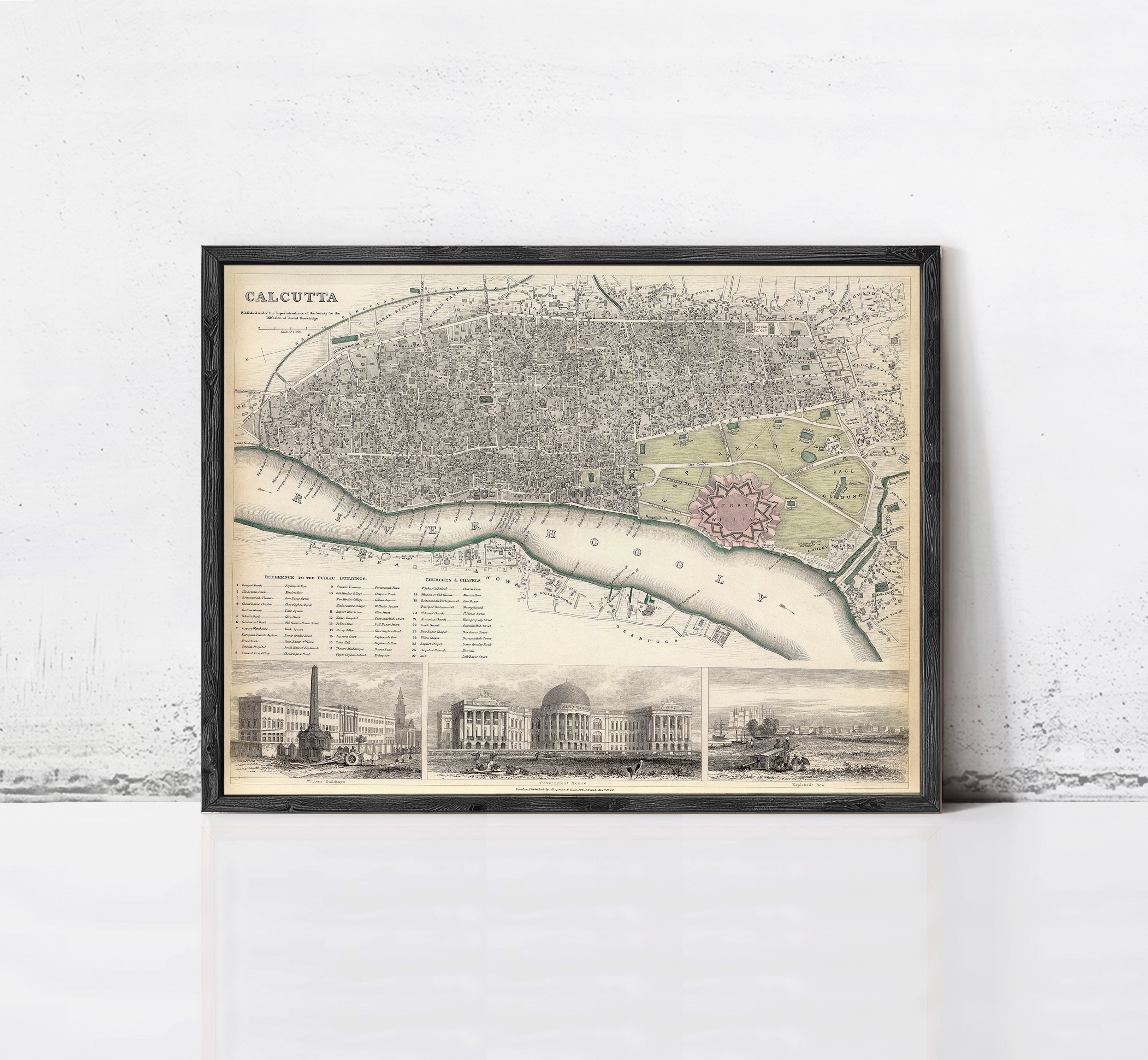 The image is a framed vintage map of Calcutta, India, depicting the city's layout and surrounding areas.