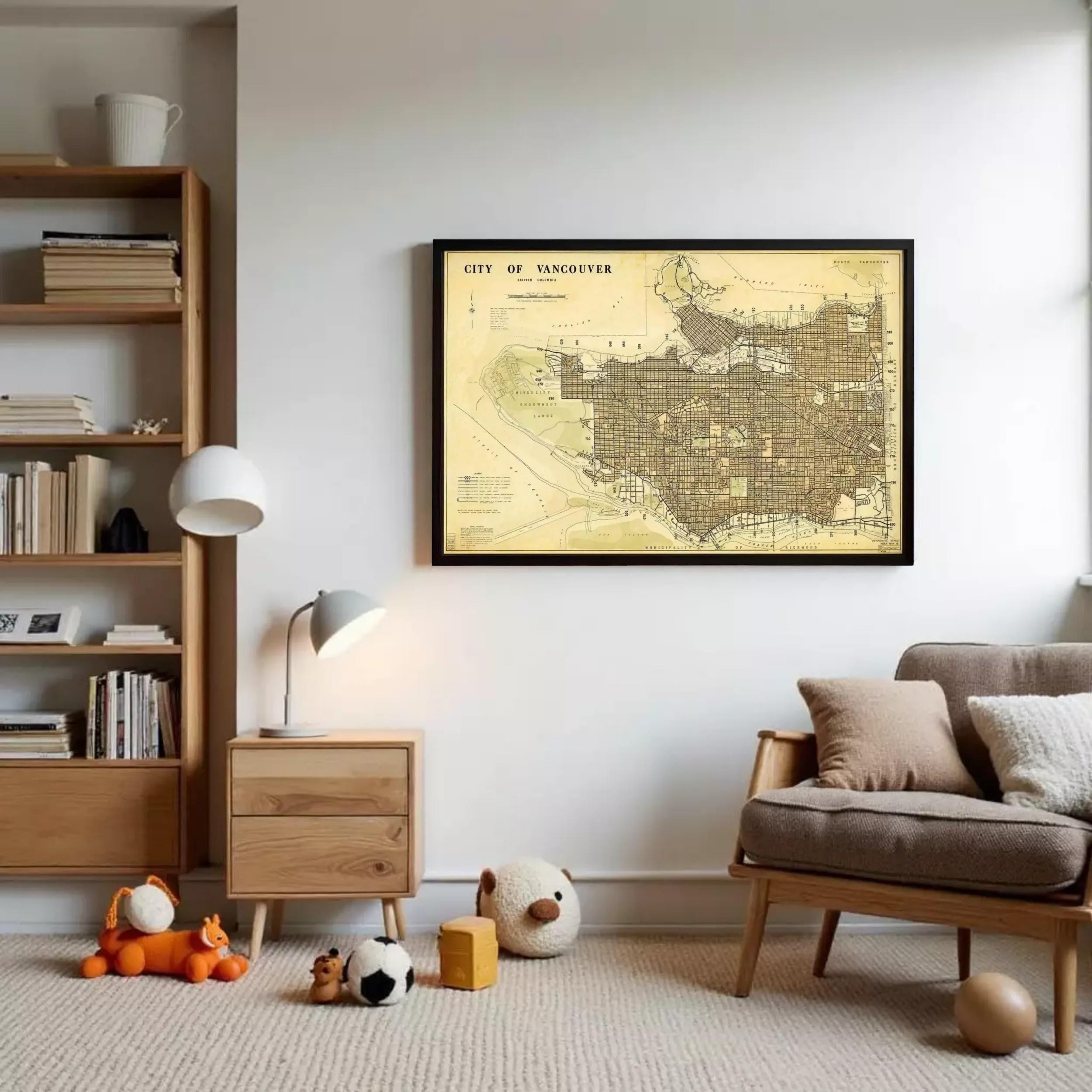 a cozy living room with a large framed map of Vancouver, Canada, hanging on the wall. The room is furnished with a couch, a bookshelf, and a lamp, creating a comfortable and inviting atmosphere.