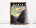 The image is a framed vintage travel poster depicting a scenic landscape with mountains, water, and clouds, with the text "This is Alaska" prominently displayed.