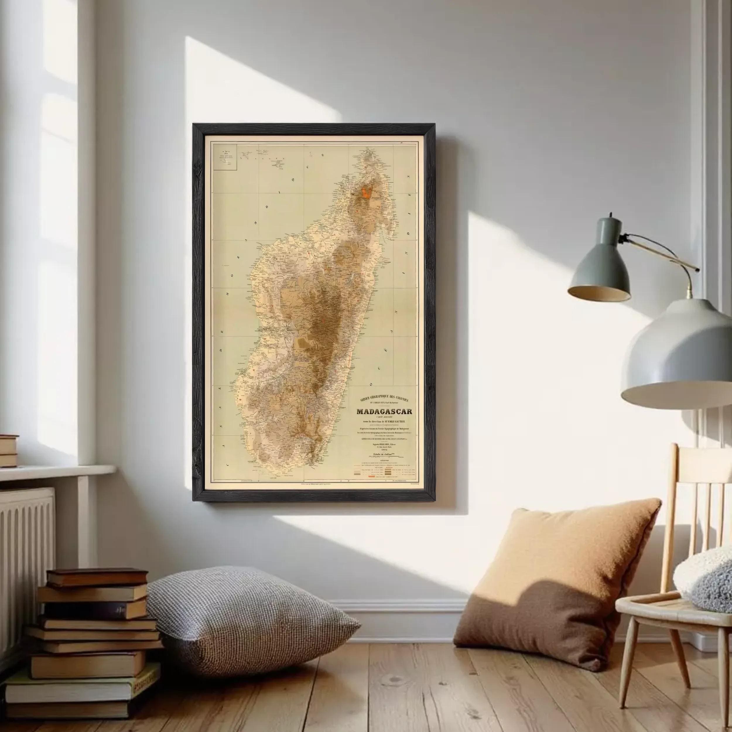 The image is a framed map of Madagascar, a country in the South Pacific, with a vintage style and a beige color scheme.