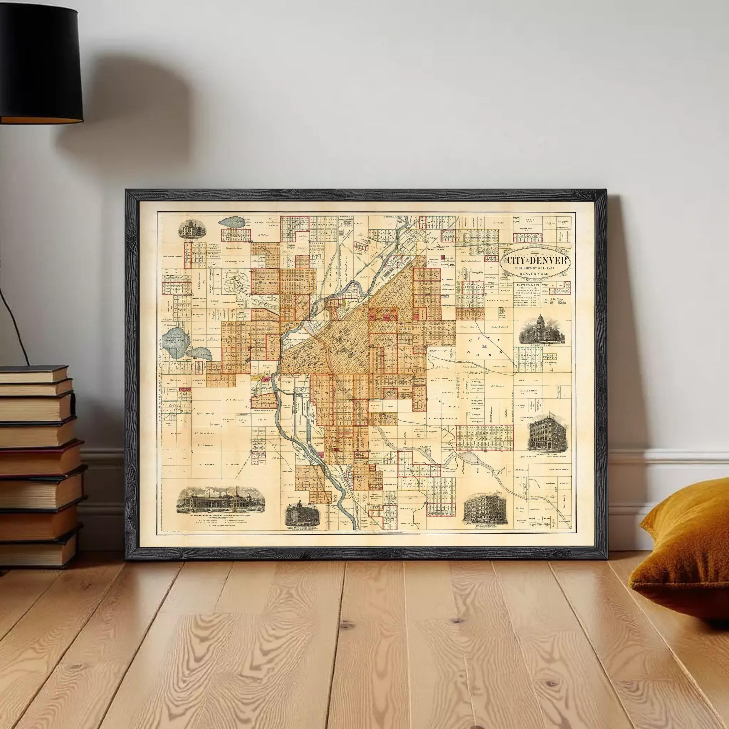 The image is a framed vintage map of the city of Denver, Colorado, depicting various landmarks and streets.