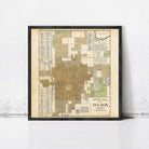 The image is a framed vintage map of Tucson, Arizona, depicting the city's layout and surrounding areas.