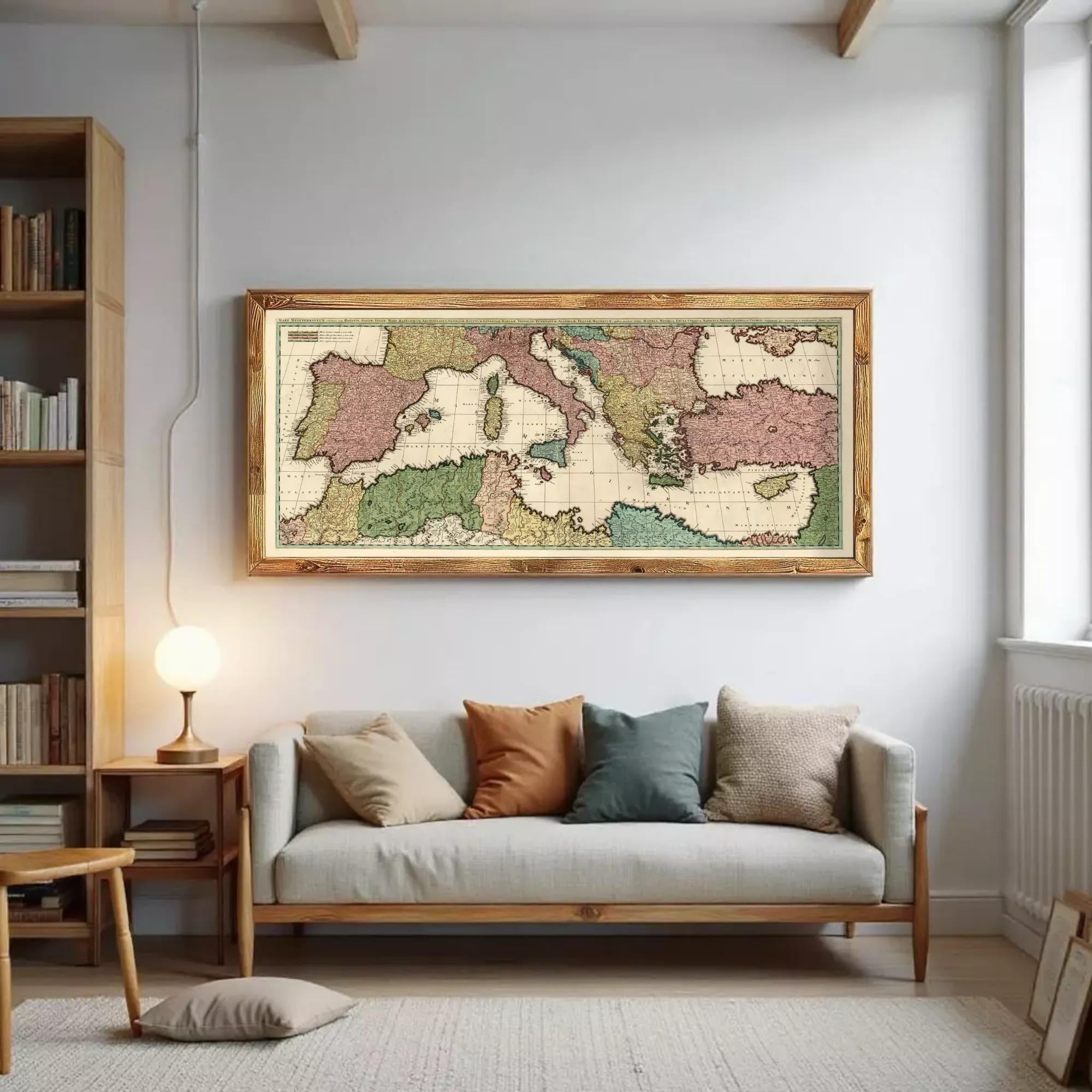 The image is a framed vintage map of Europe and the surrounding areas, displayed on a white wall.