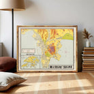 The image is a framed map of Hong Kong, showing the city's streets, landmarks, and surrounding areas.