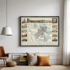 The image is a framed vintage map of a city, featuring various landmarks and buildings depicted in a collage-like arrangement.