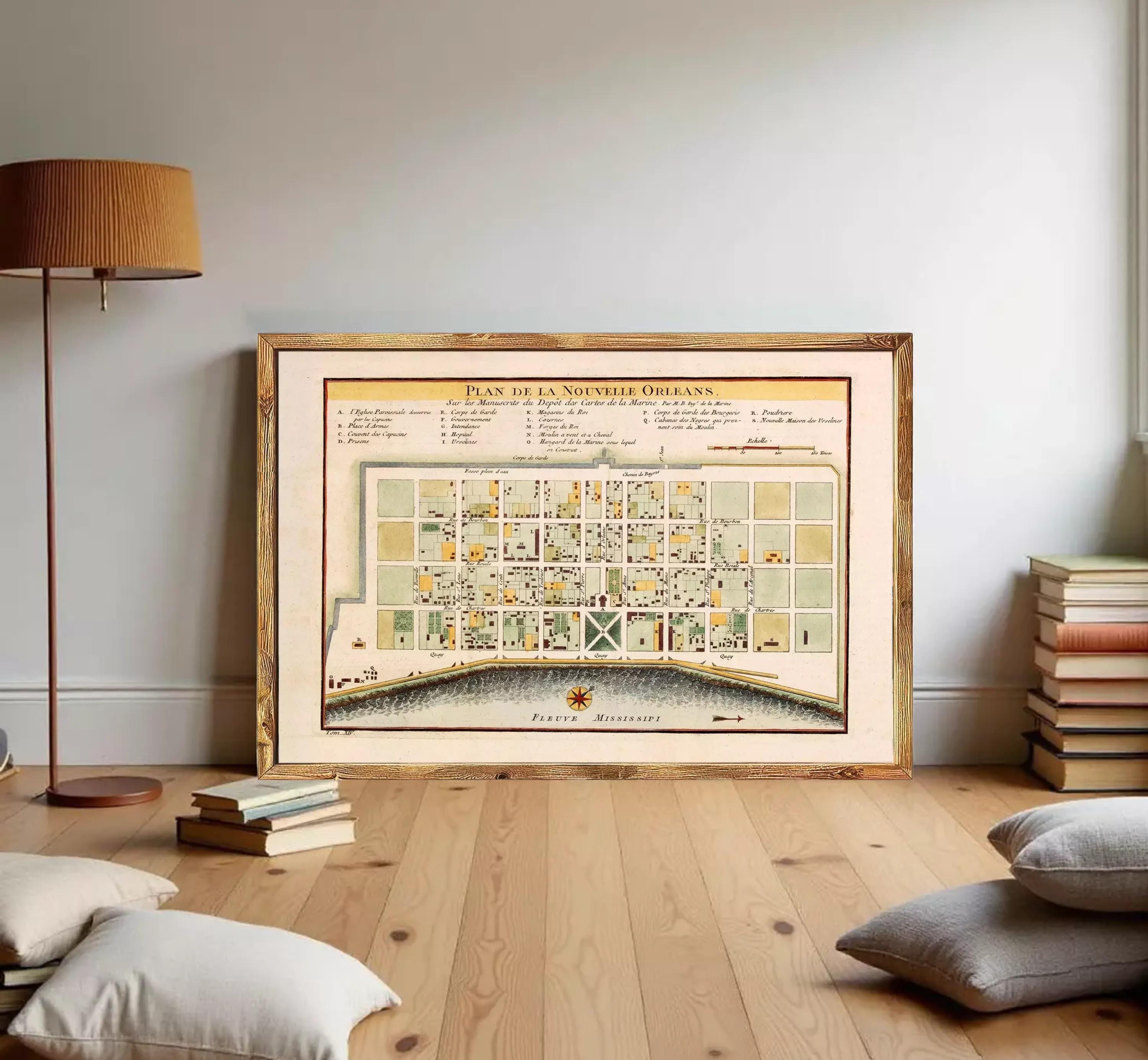 The image is a framed vintage map of the city of Orleans, Louisiana, with a detailed layout of the city's streets and buildings.
