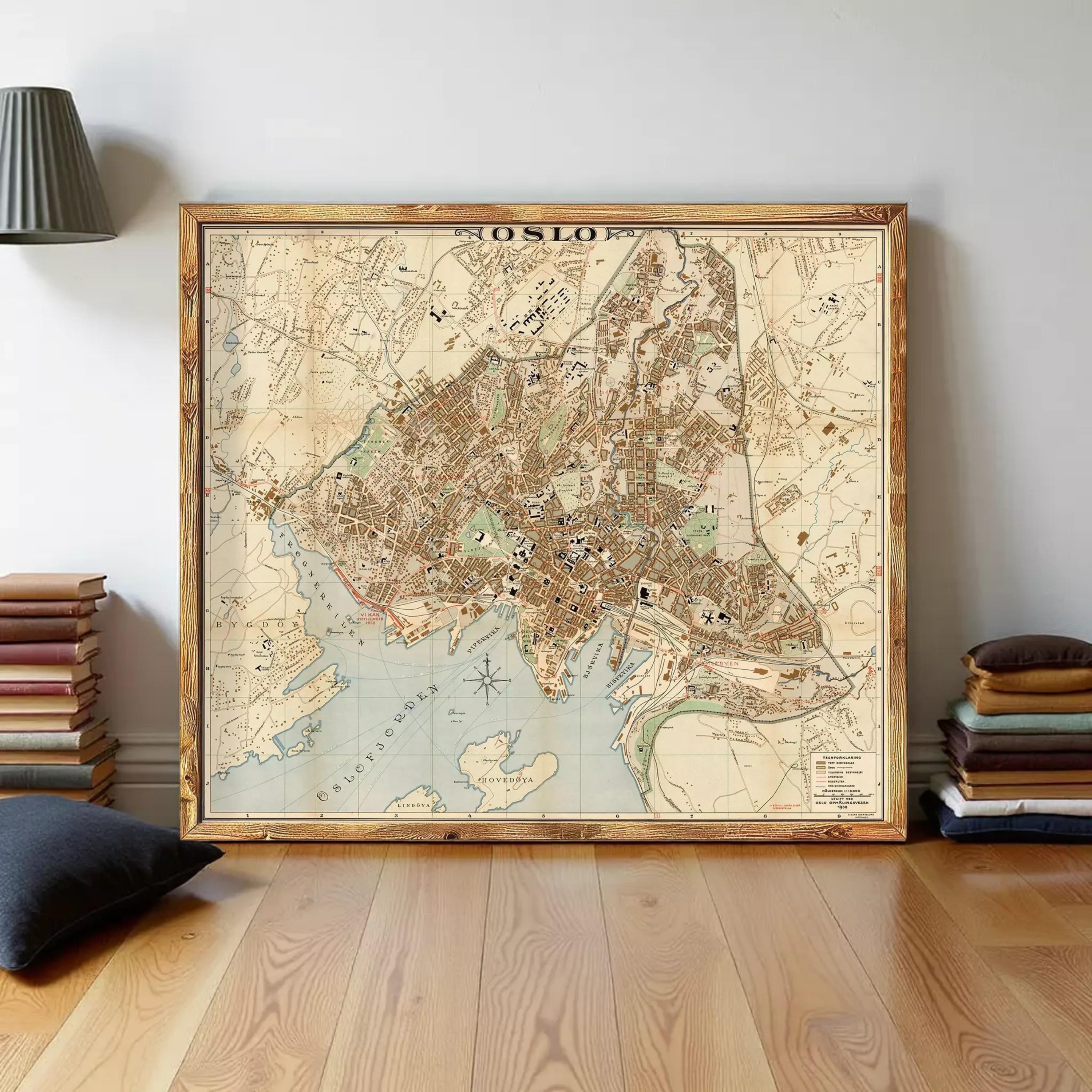 a large framed map ofOSLO, a city, with a wooden floor and stacks of books on the side.