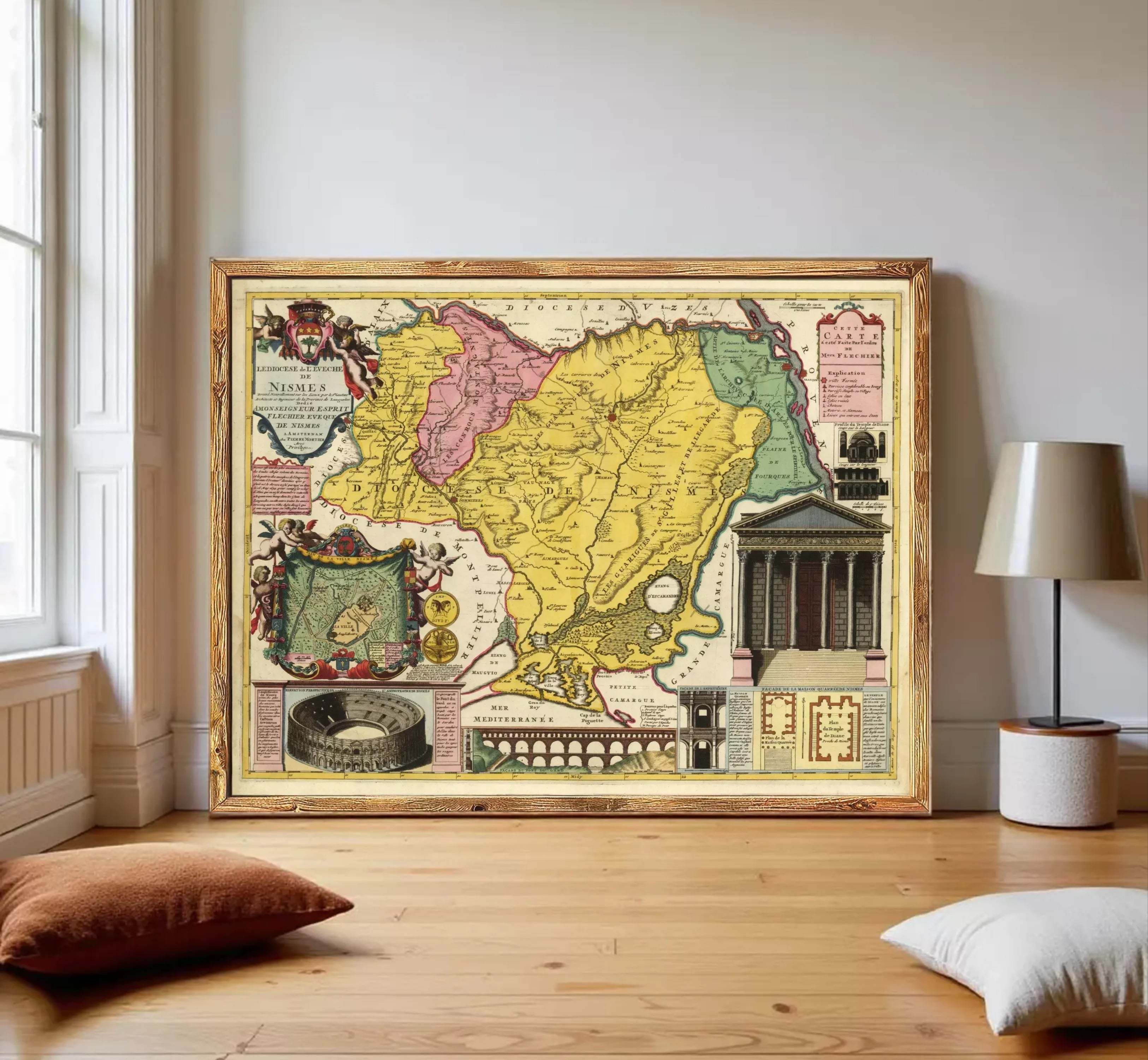 The image is a framed vintage map of the Nubia region, which includes illustrations of the Roman Colosseum, a temple, and other landmarks.
