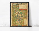 The image is a framed vintage map of a town or city, with detailed illustrations and labels.