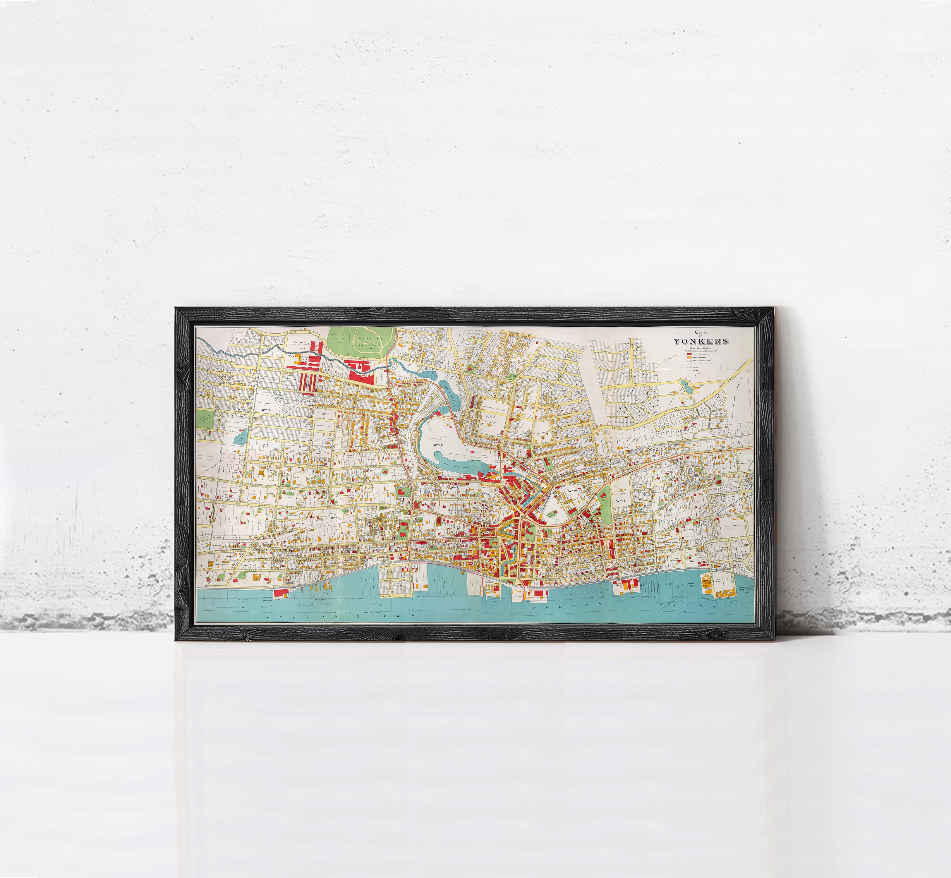 The image is a framed map of a city, likely York, with various streets, landmarks, and other geographical features depicted.
