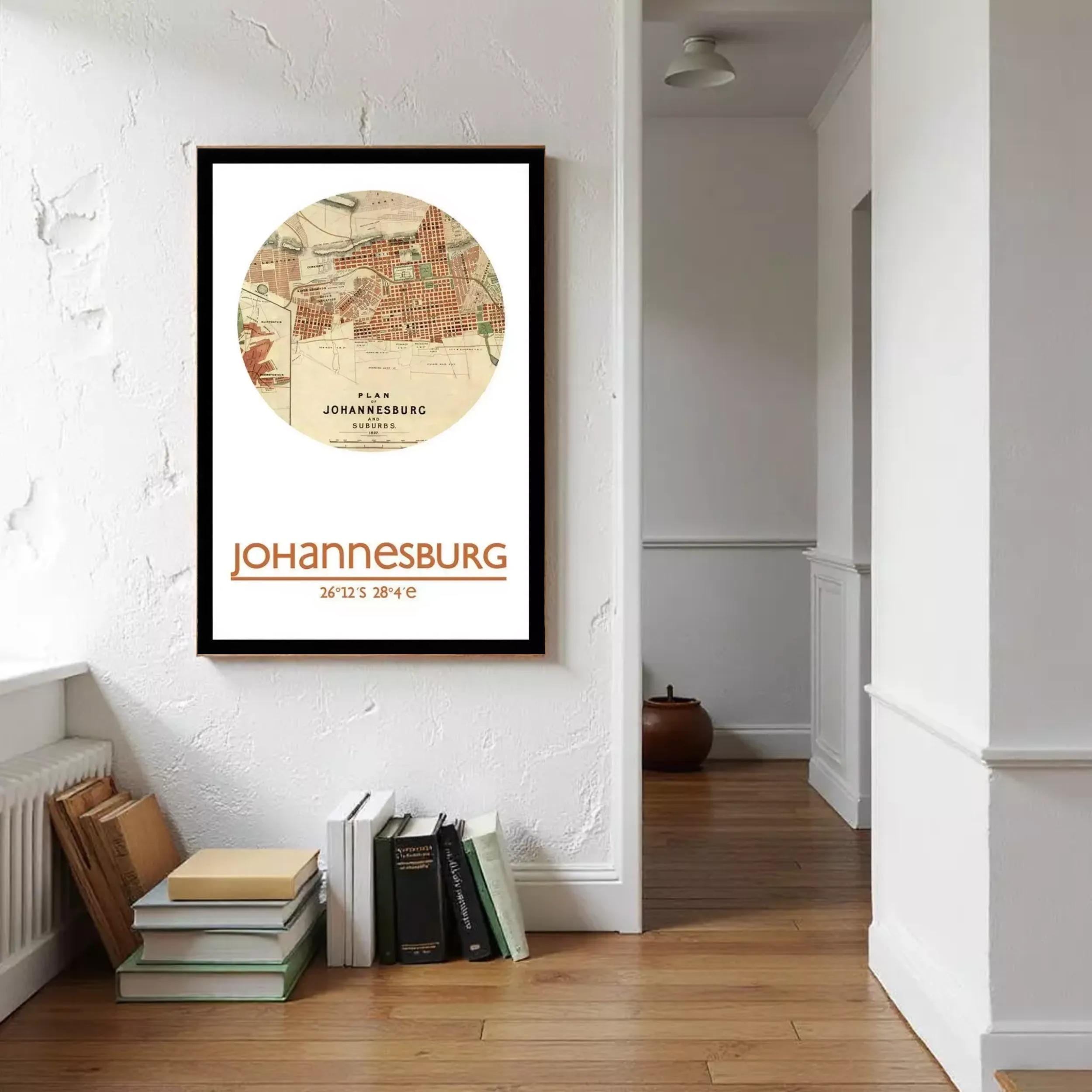 a framed poster of a map of Johannesburg, South Africa, hanging on a white wall.
